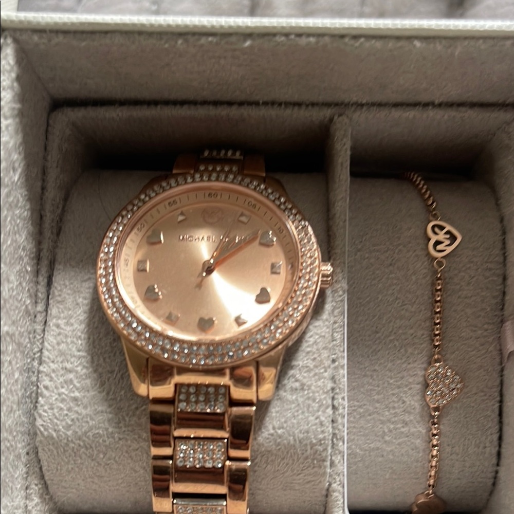 Michael Kors Rose Gold Women's Watch and Bracelet Set
This is Rose Gold